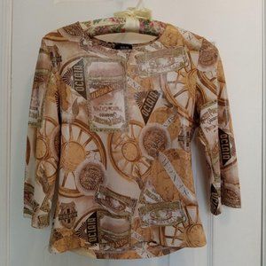 Vintage shimmery three quarter length sleeved graphic top